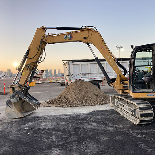 digger on the tarmac at san diego airport