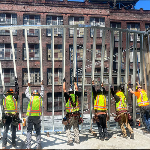 Construction crew on expansion of mezzanine structure