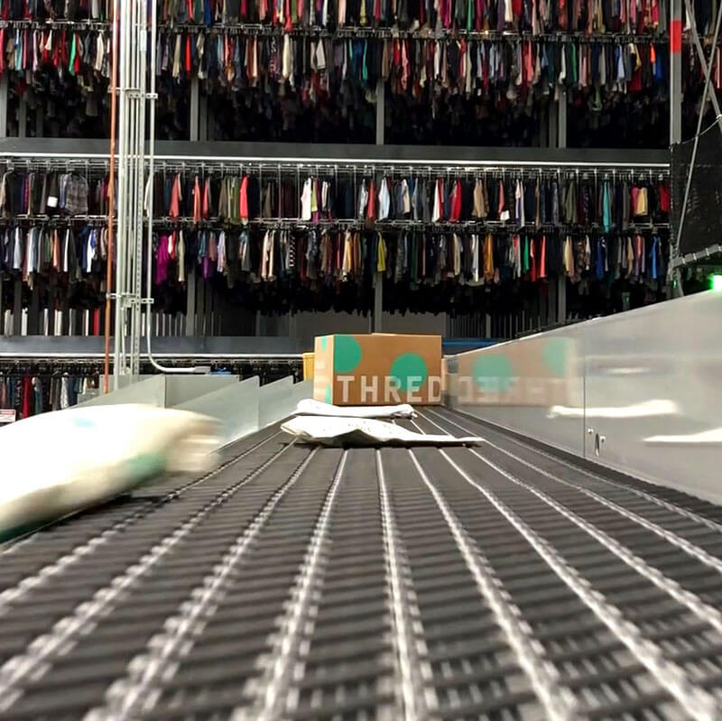 thredup parcel on conveyor and sortaton system