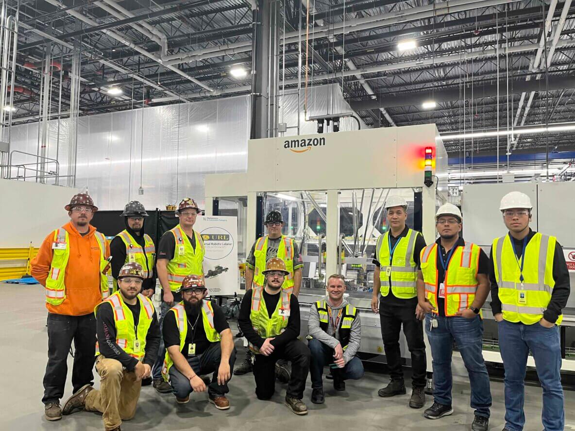 millwrights and electrticians at Amazon BOS for URL installation training
