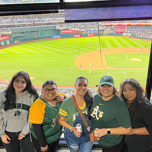 team members at oakland As game