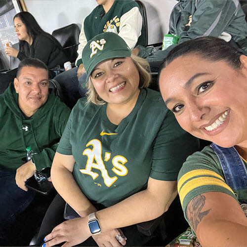 team members at oakland As game